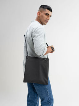 DailyObjects - Unisex Solid Basalt Pivot Expandable Sling Bag