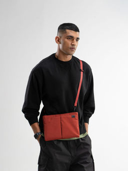 DailyObjects - Unisex Solid Pivot Sling Bag - Orange (M)