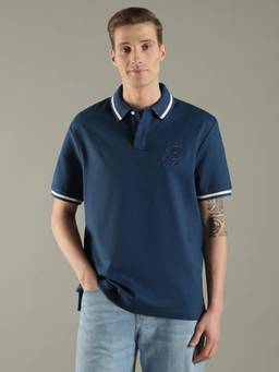 Tommy Hilfiger - Men Navy Blue Solid Regular Fit Cotton Polo T-Shirt