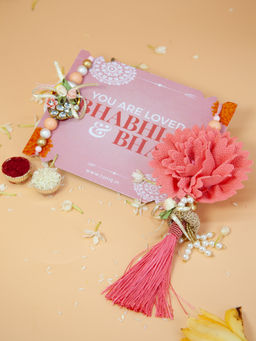 Fida - Set Of 2 Handmade Pink Tassel Floral Pearl Bhaiya Bhabhi Rakhi With Roli Chawal