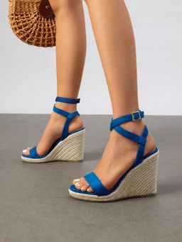 IRUSSH - Vibrant Blue Suede Crisscross Wedges