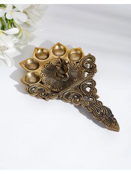 Fabindia - Brass Mehnoor Casted Peacock Oil Lamp