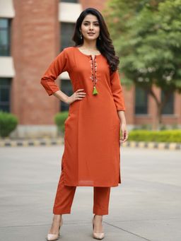 Varanga - Women Rust Embroidered Tassels Kurta with Pant