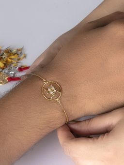 Ornate Jewels - 925 Sterling Silver Gold Plated American Diamond Swastik Rakhi Bracelet for Bhai