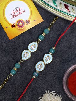 Karatcart - Gold Plated Light Blue Handmade Kundan Bhaiya Bhabhi Rakhi Combo