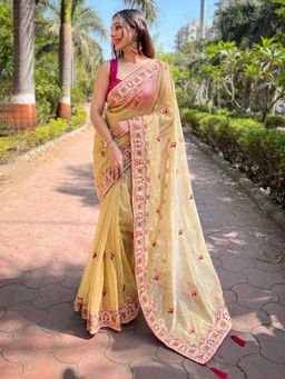 Odette - Women Yellow Embroidered Net Saree with Unstitched Blouse