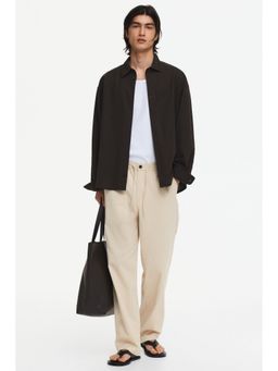 H&M - Men Beige Relaxed Fit Trousers
