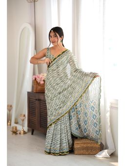 Nyri - Off White Beautiful Printed Mirror Work Chinon Saree