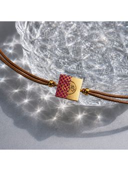 Suhani Pittie - Handcrafted and Painted Gold Cord Rakhi