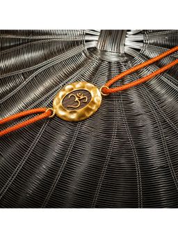 Suhani Pittie - Gold Om Orange Cord Rakhi