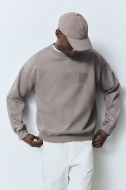 H&M - Men Beige Loose Fit Printed Sweatshirt