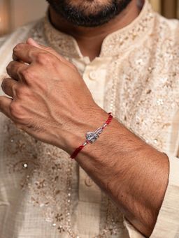 Ornate Jewels - 925 Silver Rhodium Plated Shiv Thread Rakhi With Roli Chawal