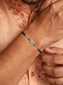 Ornate Jewels - 925 Silver Rhodium Plated Mor Pankh Thread Rakhi With Roli Chawal