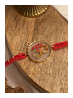 Suhani Pittie - Om 22K Gold Plated Hand Painted Round Rakhi With Red Tieups