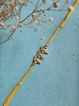 Studio Anviksha - Yellow Birdie Brass Rakhi