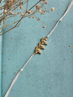 Studio Anviksha - White Brass Birdie Rakhi