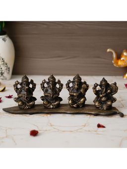 eCraftIndia - Black Lord Ganesha On A Leaf Metal Showpiece