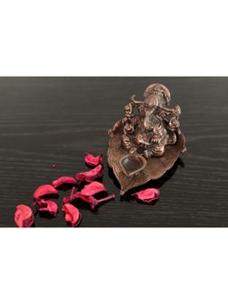 eCraftIndia - Brown Metal Lord Ganesha Idol with Diya On Leaf
