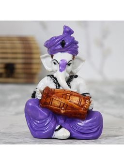 eCraftIndia - Purple Lord Ganesha Idol Playing Dholak Showpiece