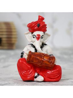 eCraftIndia - Red Lord Ganesha Idol Playing Dholak Showpiece