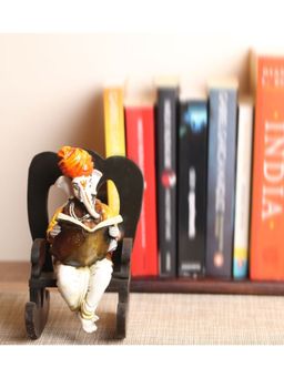 eCraftIndia - Lord Ganesha Reading Book On Wooden Chair Showpiece