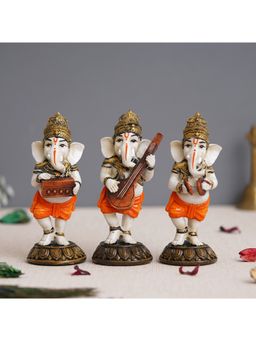 eCraftIndia - Lord Ganesha Playing Harmonium, Sitar, and Manjira Showpieces (Set Of 3)