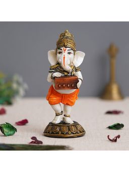eCraftIndia - Polyresin Lord Ganesha Idol Playing Harmonium Statue