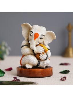 eCraftIndia - Polyresin Baby Ganesha Idol Holding Modak Statue Showpiece