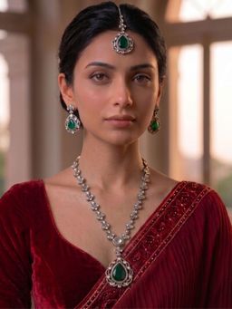 Niscka - Gold Plated Floral Emerald CZ Necklace with Waterdrop Earrings & Maang Tikka