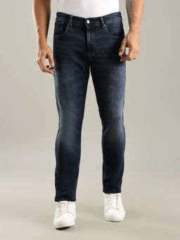 Tommy Hilfiger - Mid-Wash Slim Fit Mid Rise Jeans
