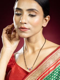 Niscka - Gold Plated Black Beads Mangalsutra with Pink and Blue Stone