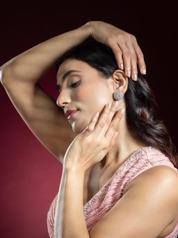 Niscka - Silver Rhodium Plated White AD Floral Stud Earrings