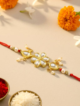 Karatcart - White Gold-Plated Floral Kundan Rakhi with Roli Chawal