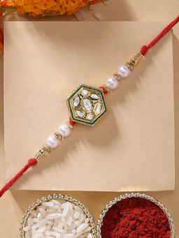 Karatcart - Elegant White Pearl and Polki Kundan Handmade Rakhi with Roli Chawal