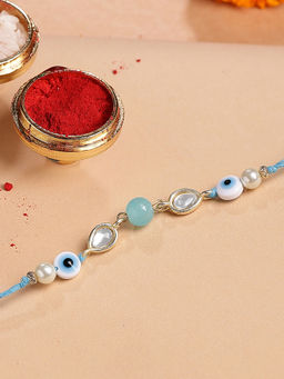 Karatcart - Gold Plated Light Blue Bead Evil Eye Kundan Bhaiya Rakhi with Roli Chawal