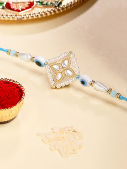 Karatcart - Blue Evil Eye and Pearl Kundan Rakhi with Roli & Chawal