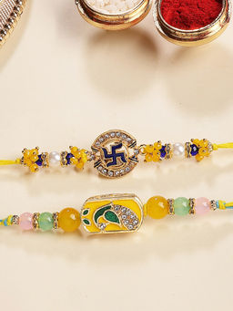 Karatcart - Multi-Color Peacock & Swastik Enamel Kundan Rakhis with Roli & Chawal (Pack of 2)