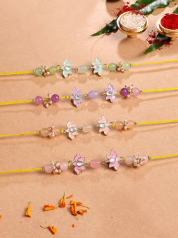 Karatcart - Multi-Color Pastel Lotus Enamel Kundan Rakhi with Roli & Chawal (Pack of 4)