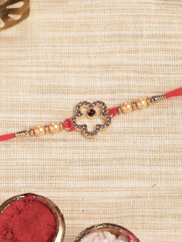 Karatcart - Gold Plated Brown American Diamond Bhaiya Kundan Rakhi with Roli & Chawal