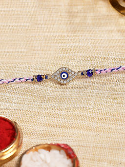 Karatcart - Gold Plated Blue American Diamond Evil Eye Bhaiya Kundan Rakhi with Roli & Chawal