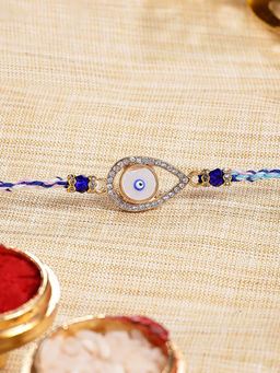 Karatcart - Gold Plated Blue American Diamond Drop Shape Evil Eye Kundan Rakhi with Roli & Chawal