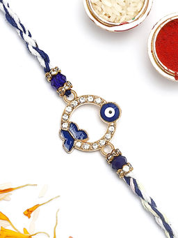Karatcart - Gold Plated Blue AD Butterfly Shape Evil Eye Bhaiya Kundan Rakhi with Roli & Chawal