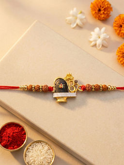 Karatcart - Multi-Color Gold Plated Rudraksha Studded Shivling Kundan Rakhi with Roli & Chawal