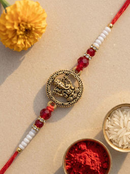 Karatcart - Multi-Color Gold Plated Crystal Ganesha Bhaiya Kundan Rakhi with Roli & Chawal