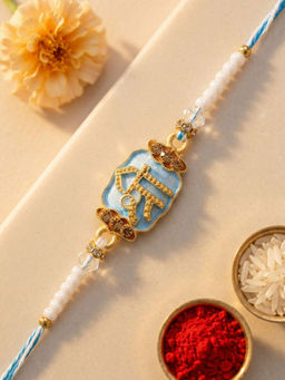 Karatcart - Gold Plated Light Blue Meenakari Shree Radha Rani Kundan Rakhi with Roli & Chawal