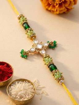 Karatcart - Gold Plated Green Crystal Floral Kundan Bhaiya Rakhi with Roli & Chawal