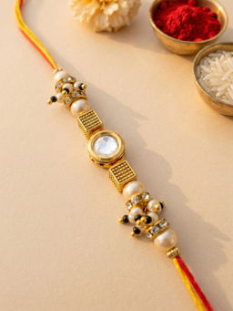 Karatcart - Off White Gold Plated Polki Kundan and Pearl Bhaiya Rakhi with Roli & Chawal