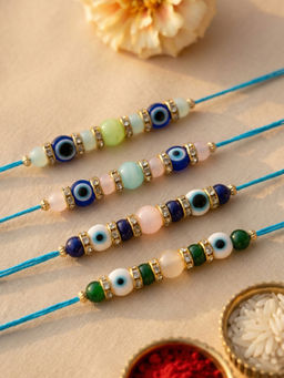 Karatcart - Multi-Color Evil Eye Beaded Kundan Rakhi with Roli & Chawal (Pack of 4)