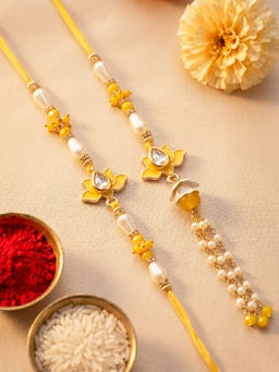 Karatcart - Gold Plated Yellow Lotus Floral Bhaiya Rakhi & Lumba with Roli & Chawal