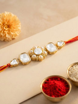 Karatcart - Gold Plated White Pearl Studded Floral Kundan Bhaiya Rakhi with Roli & Chawal